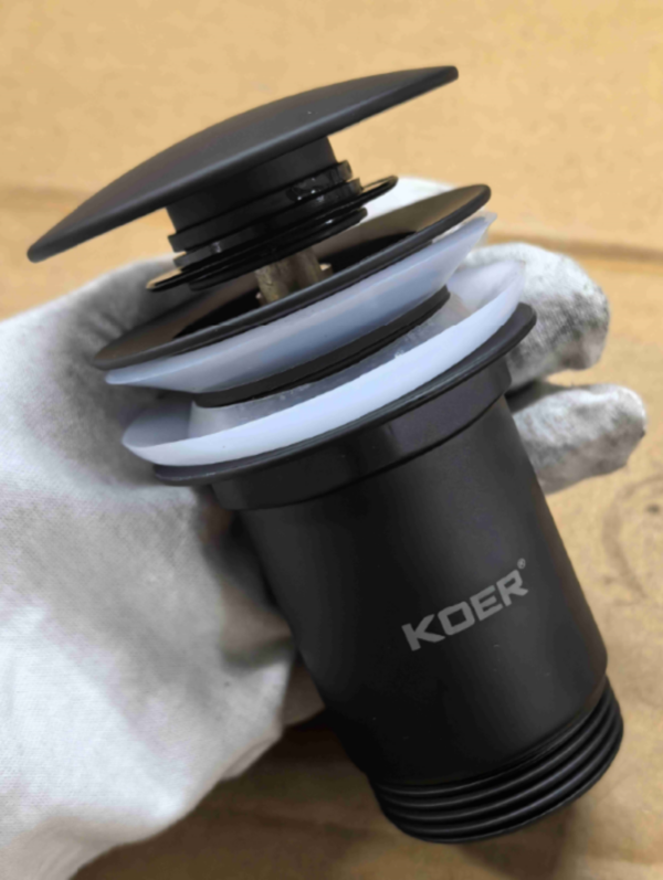 Донний клапан для раковини з переливом KOER PW-07-05 автоматичний (Click-Clack) (Колір чорний) 1 1/4'' Донний клапан для раковини з переливом KOER PW-07-05 автоматичний (Click-Clack) (Колір чорний) 1 1/4''