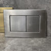 Панель змиву KOER KT-0612-07 240x160x10mm з нержавіючої сталі, кнопка квадратна (колір графіт) Панель змиву KOER KT-0612-07 240x160x10mm з нержавіючої сталі, кнопка квадратна (колір графіт)